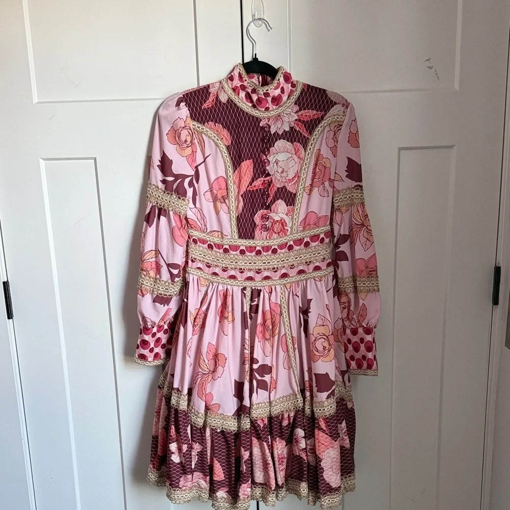 It’s giving Zimmerman without the price tag! Pink and burgundy floral dress sm.